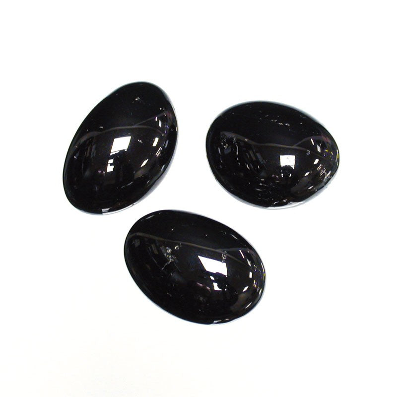 Pierres Noires en Lithothérapie : Vertus et Signification