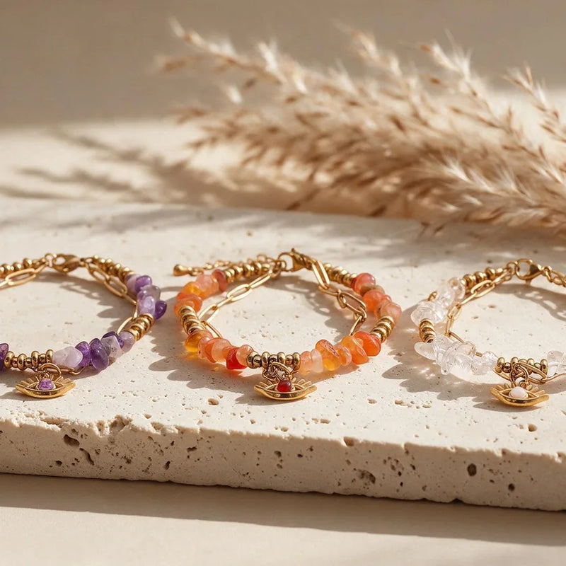 Bracelets mauvais œil en pierre naturelle OCULUS®, sur travertin