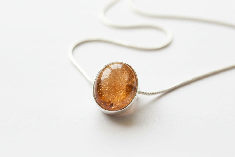 Pendentif en pierre de soleil naturelle véritable monté sur argent 925 rhodié