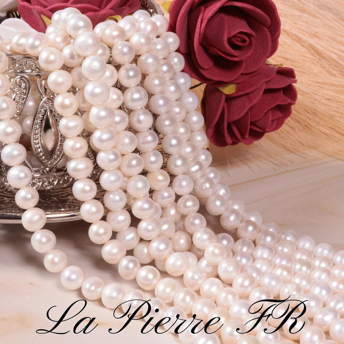 Fil de perles de culture blanches, eau douce, reflets nacrés délicats pour créations raffinées