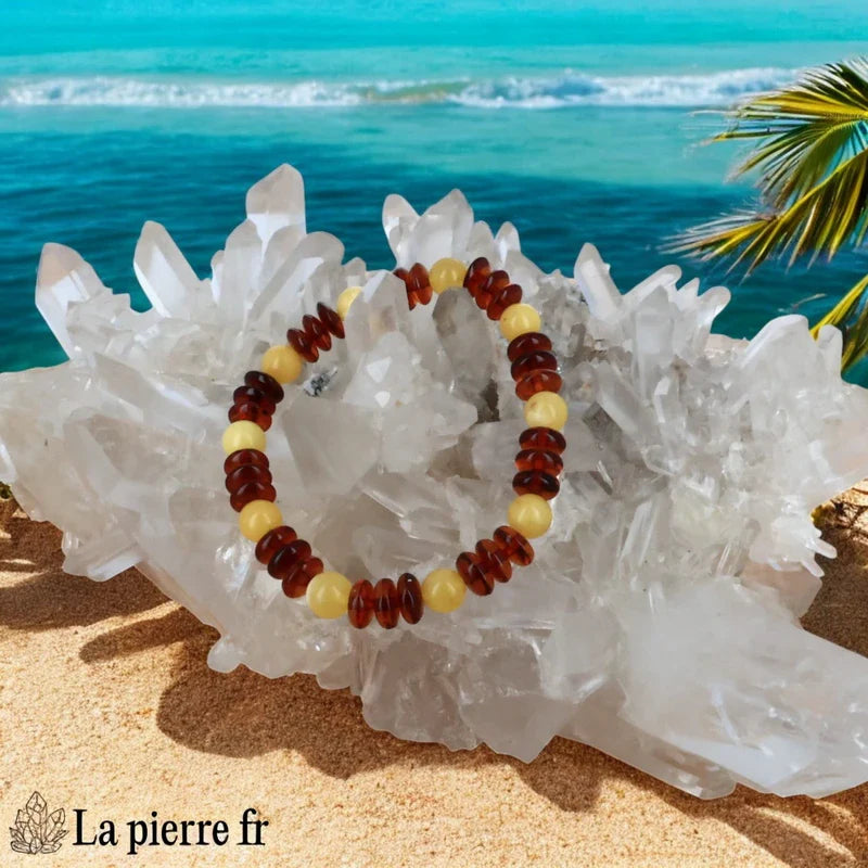 Bracelet en Ambre de la Baltique véritable avec une alternance de disques plats couleur cognac et de perles boules couleur miel.