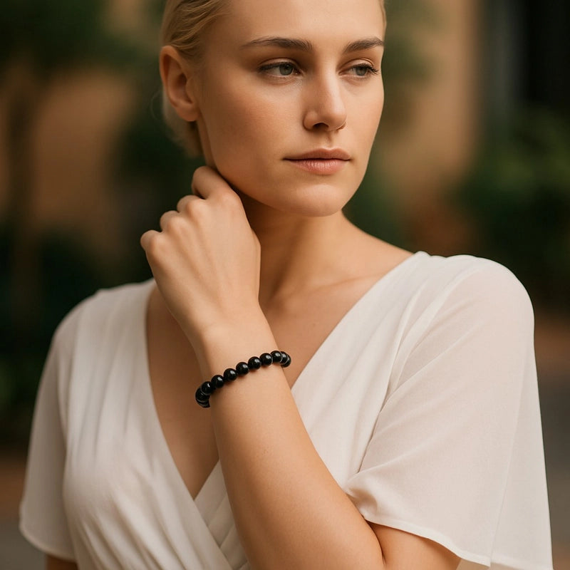 Bracelet Hypersthène femme – perles sombres et chatoiement métallique