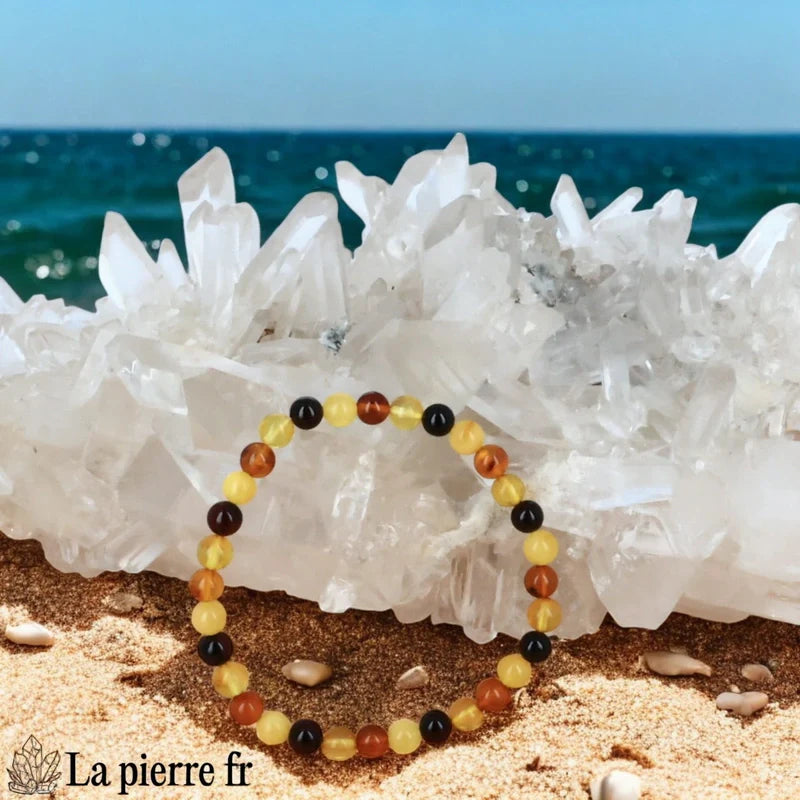 Bracelet unisexe en Ambre de la Baltique véritable, composé de perles rondes multicolores de 5-6mm aux teintes cognac, miel et citron.