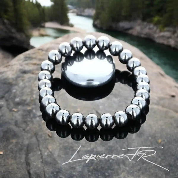 Bracelet pierre naturelle en Hématite, bijou de lithothérapie gris métal pour la confiance, la vitalité et la protection. Bracelet sur mesure pour femme et homme – La Pierre FR.
