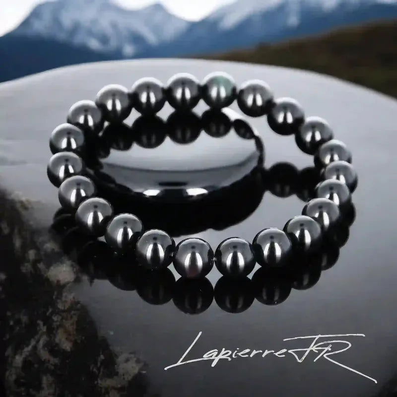 Détail reflets colorés ("œil") du bracelet pierre naturelle Obsidienne Œil Céleste véritable. Qualité lithothérapie pour protection de l'aura.