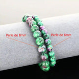Bracelet de lithothérapie en Rubis Zoïsite véritable porté au poignet, bijou pierre naturelle vert/rose pour chakra cœur et vitalité.