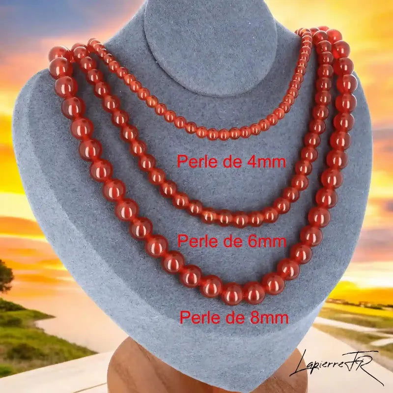 Collier Cornaline, bijou femme en pierre naturelle, perles rondes aux teintes orangées et rouges, favorisant la créativité, l’énergie et la détermination.