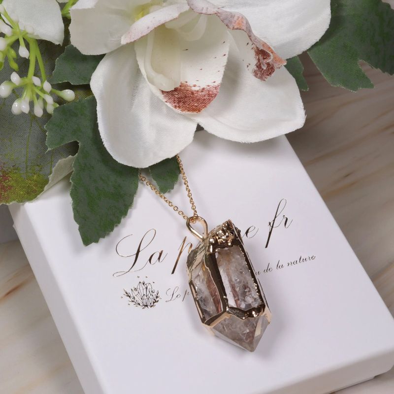 Pendentif Cristal de Roche en pointe serti doré - La Pierre FR