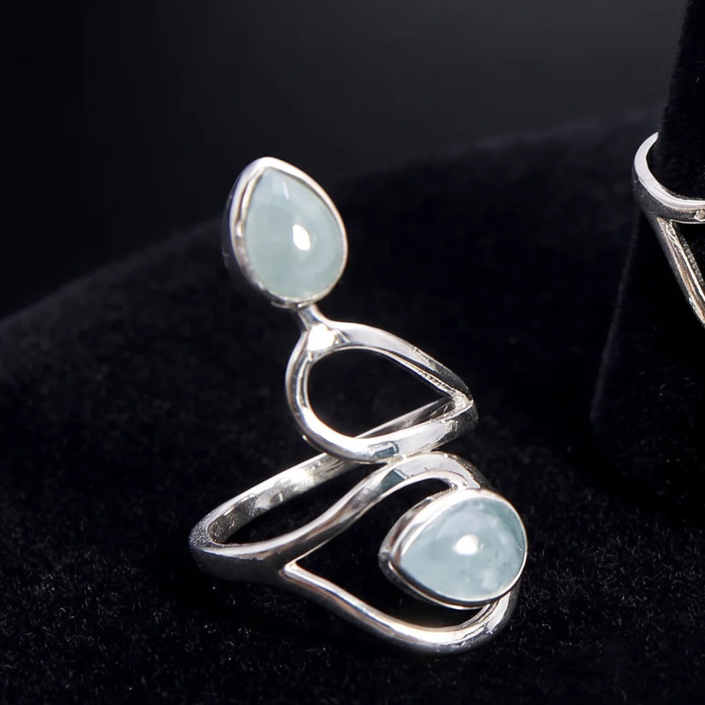Bague aigue-marine argent 925, deux gouttes reliées par des volutes