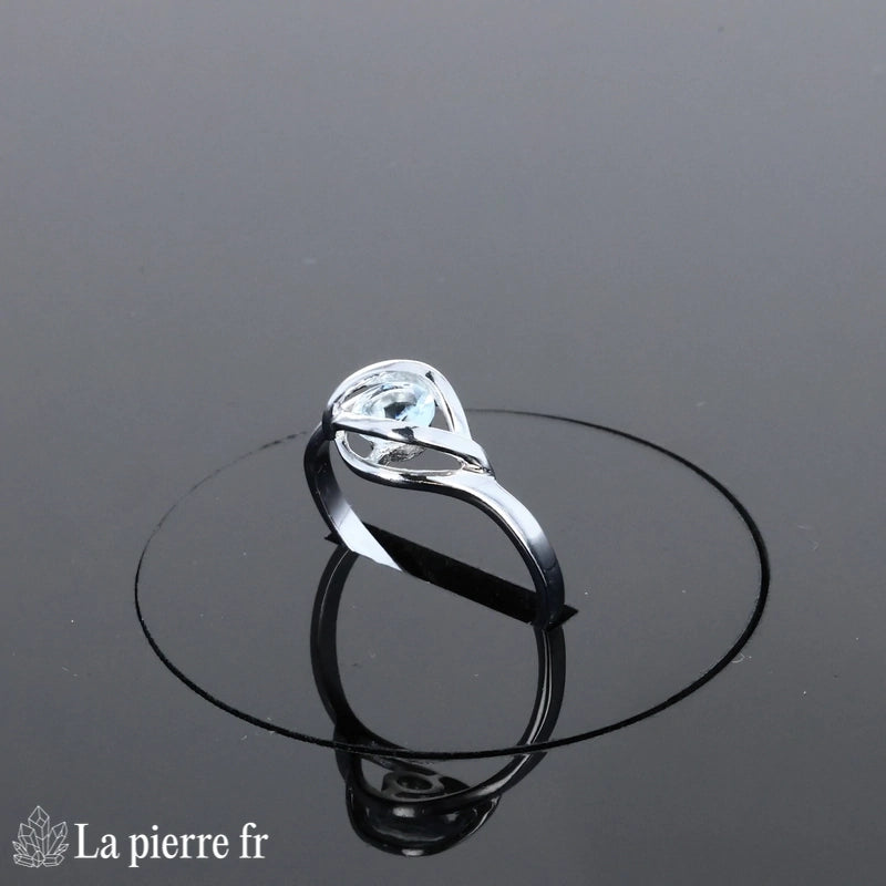 Bague Aigue-Marine (Éclat Solitaire Rond) en argent rhodié, pierre ronde 5mm - Vue de dessus, style minimaliste.