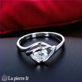 Bague Aigue-Marine (Éclat Solitaire Rond) en argent rhodié, pierre ronde 5mm - Vue de dessus, style minimaliste.