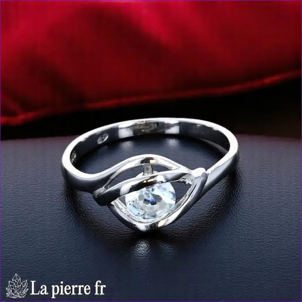 Bague Aigue-Marine (Éclat Solitaire Rond) en argent rhodié, pierre ronde 5mm - Vue de dessus, style minimaliste.