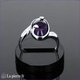 Bague classique pour femme en argent rhodié avec pierre en améthyste naturelle ovale (8x12mm) finition cabochon.