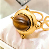 Bague cabochon en Œil de tigre ÉCRIN®, acier doré