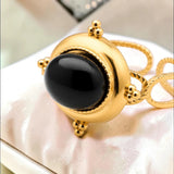 Bague cabochon en Onyx noir ÉCRIN®, acier doré