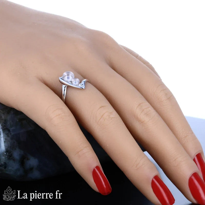 Gros plan sur les deux quartz roses ronds Bague (Duo Tendresse) moderne