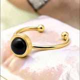 Bague fine dorée en Onyx noir FILINE®