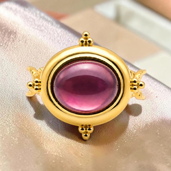 Bague grosse pierre améthyste dorée
