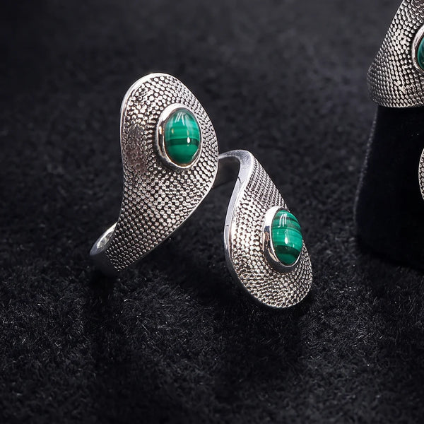 Bague malachite argent 925 rhodié, deux cabochons verts zébrés sur gouttes croisées