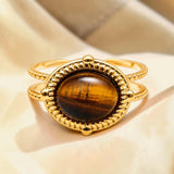 Bague cabochon ovale en Œil de tigre OVALIA®, acier doré
