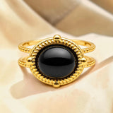 Bague cabochon ovale en Onyx noir OVALIA®, acier doré