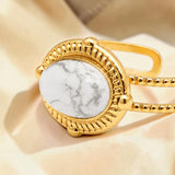 Bague cabochon ovale en Howlite blanche OVALIA®, acier doré