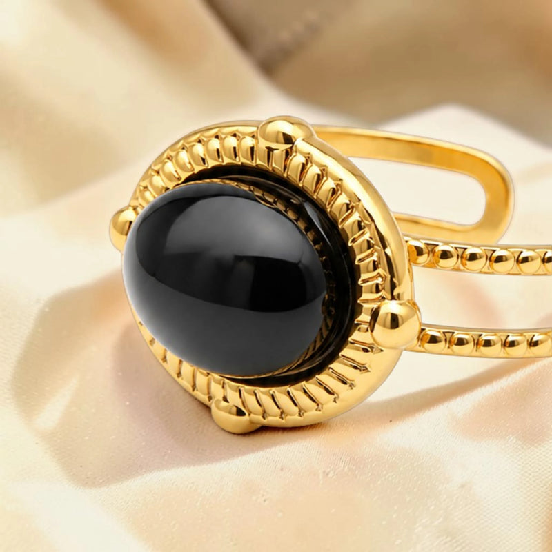 Bague cabochon ovale en Onyx noir OVALIA®, acier doré
