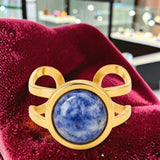 Bague double anneau en Sodalite DUALIS®, acier doré
