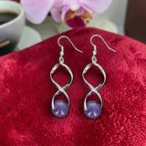 Boucles d'oreilles spirale en Améthyste naturelle – Élégance et sérénité