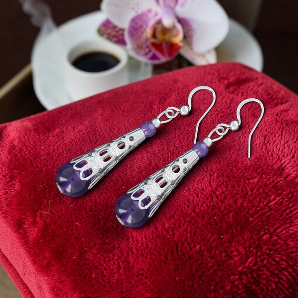 Détail boucles d’oreilles acier inoxydable améthyste