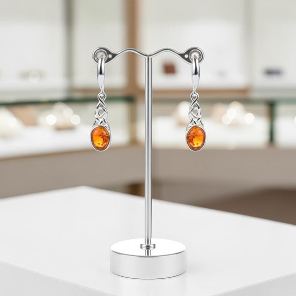 Détail monture celtique tressée argent rhodié boucles ambre Sabik