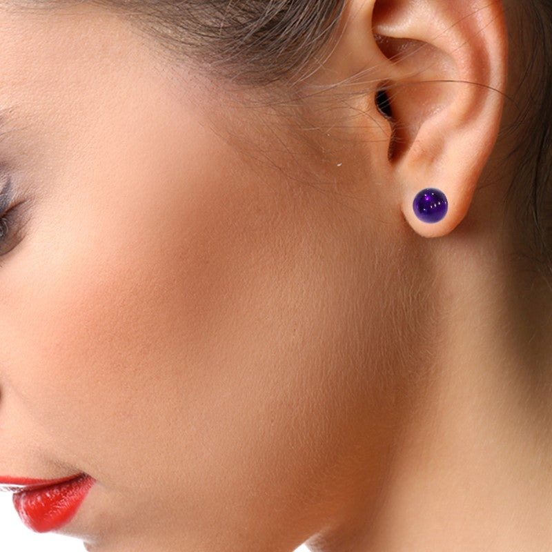 Boucles d'oreilles améthyste Vega portées sur oreille