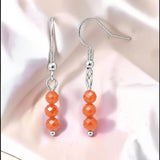 Boucles d'Oreilles Cornaline PRISMA® – 3 boules 4 mm, acier argenté