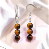 Boucles d'Oreilles Œil de Tigre SPHERA® – 3 boules 6 mm, acier argenté
