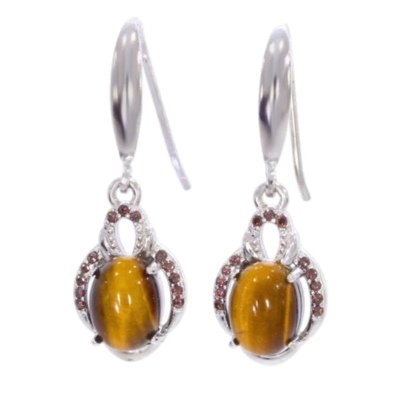 Paire de boucles d'oreilles œil de tigre Saïph sur fond blanc, argent 925 rhodié