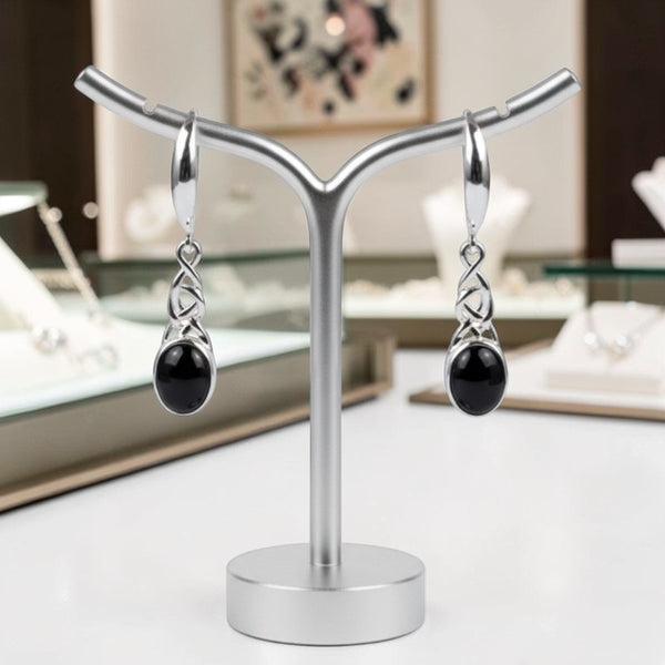 Détail monture celtique tressée argent rhodié boucles onyx Kaus