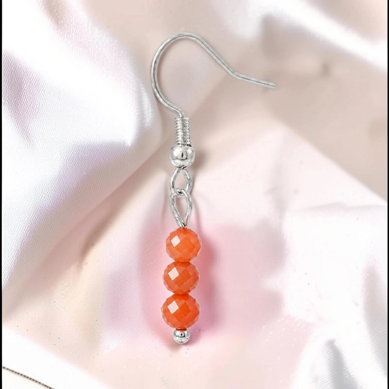 Boucle d'oreille pendante femme en pierre cornaline orange facettée du Brésil