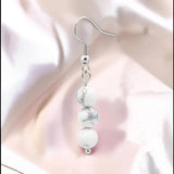 Boucles d'Oreilles Howlite blanche SPHERA® – 3 boules 6 mm, acier argenté