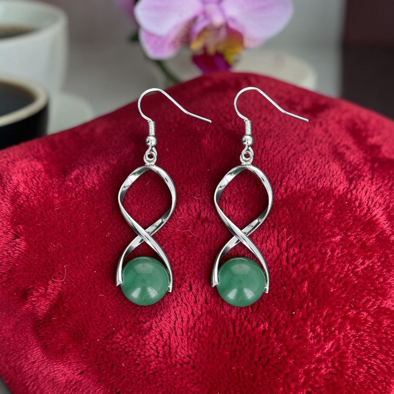 Détail boucles d’oreilles en pierre naturelle aventurine