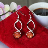Boucles d’oreilles spirale en Cornaline naturelle