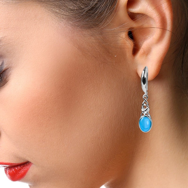 Boucles d'oreilles turquoise Thuban portées sur oreille