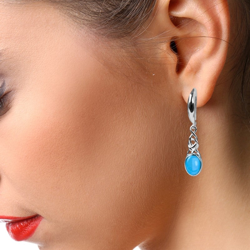 Boucles d'oreilles turquoise Thuban portées sur oreille
