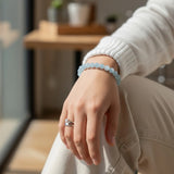 bracelet aigue-marine femme perles 6/8 mm porté au poignet