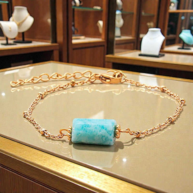 Bracelet Amazonite LINE® en pierre bleue tube facettée sur chaîne dorée