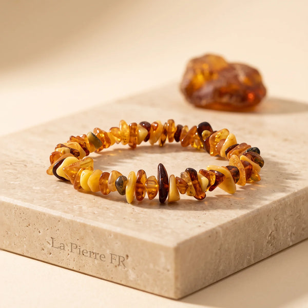 Bracelet en ambre baroque multicolore de la Baltique, pierre véritable posée sur travertin
