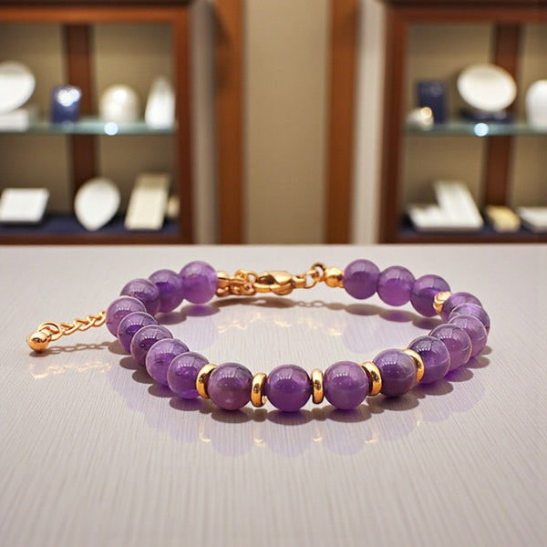 Bracelet Améthyste AURA® en perles de pierre naturelle 6 mm avec montage doré