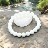 Bracelet perle naturelle Coquillage blanc pour protection, pureté et sérénité