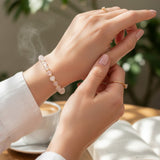 Bracelet Cristal de roche AURA® – perles 6 mm en pierre naturelle & dorée