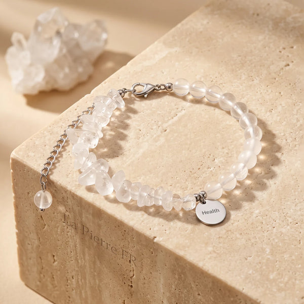 Bracelet cristal de roche baroque et perles rondes de quartz, chaîne en acier argenté