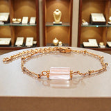 Bracelet Cristal de roche LINE® – pierre blanche tube facettée sur chaîne dorée